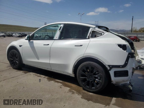 2022 Tesla Model Y Long Range with VIN 7SAYGDEE0NF436885, listed as a Copart auction lot 52101735 with 35,799 mi miles and Salvage Title. Bid and sale history available at carsss.com. Image 2.