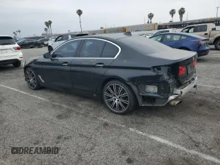 2017 BMW 5 Series 540i with VIN WBAJE5C33HG915675, listed as a Copart auction lot 55857135 with 57,330 mi miles and Salvage title. Bid and sale history available at DreamBid. Image 2.