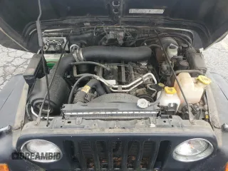 2000 Jeep Wrangler Sahara with VIN 1J4FA59S5YP761127, listed as a Copart auction lot 65247225 with 174,274 mi miles and Clean title. Bid and sale history available at DreamBid. Image 12.