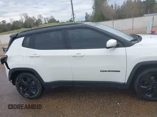 2020 Jeep Compass Latitude with VIN 3C4NJCBB9LT118042, listed as a IAAI auction lot 41811634 with 62,717 mi miles and . Bid and sale history available at carsss.com. Image 13.