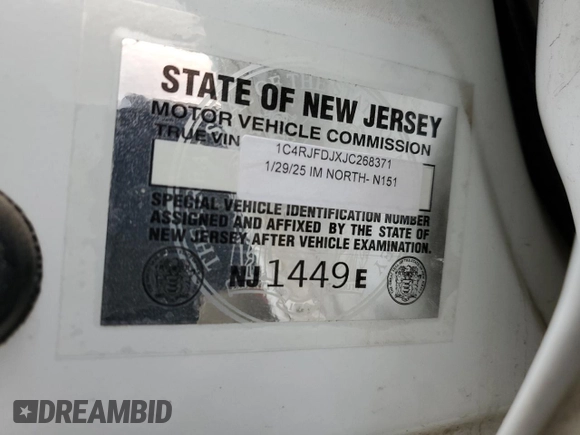 2018 Jeep Grand Cherokee with VIN NJ1449E, listed as a Copart auction lot 51357834 with 32,619 mi miles and Salvage title. Bid and sale history available at DreamBid. Image 12.