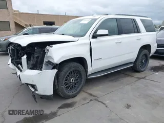 2019 GMC Yukon SLT with VIN 1GKS2BKC3KR160060, listed as a IAAI auction lot 42042122 with 124,733 mi miles. Bid and sale history available at carsss.com. Image 2.