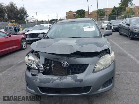 2009 Toyota Corolla with VIN JTDBL40E899066243, listed as a IAAI auction lot 41884292 with 219,338 mi miles. Bid and sale history available at carsss.com. Image 12.