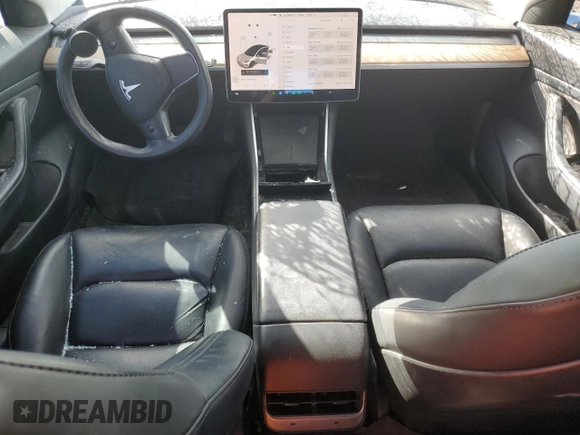 2020 Tesla Model 3 Standard Range Plus with VIN 5YJ3E1EA4LF799597, listed as a Copart auction lot 76401374 with 77,506 mi miles and Salvage Title. Bid and sale history available at DreamBid. Image 8.