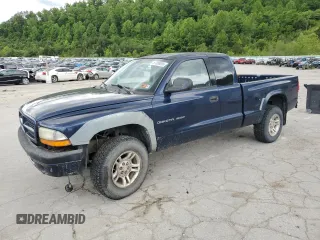 2002 Dodge Dakota z VIN 1B7GG32X32S546515, wystawiony jako Copart lot #57888695 z przebiegiem 81 202 mil mil oraz Szkoda całkowita • Salvage title. Historia ofert i sprzedaży dostępna na DreamBid. Obrazek 1.