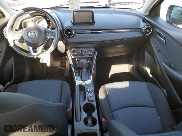 2016 Scion iA with VIN 3MYDLBZV8GY135344, listed as a Copart auction lot 82652693 with 100,004 mi miles. Bid and sale history available at carsss.com. Image 8.
