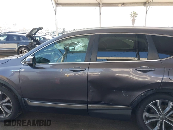 2020 Honda CR-V Touring z VIN 7FART6H91LE000684, wystawiony jako IAAI lot #42504731 z przebiegiem 49 100 mil mil oraz . Historia ofert i sprzedaży dostępna na DreamBid. Obrazek 14.