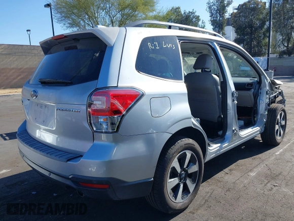 2018 Subaru Forester Limited with VIN JF2SJARC4JH435231, listed as a IAAI auction lot 42011028 with 51,901 mi miles. Bid and sale history available at carsss.com. Image 4.