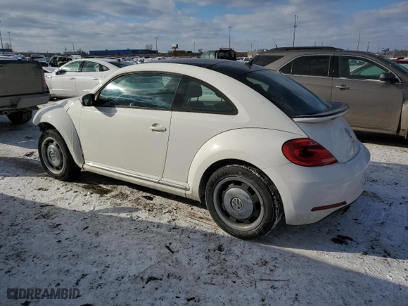 2012 Volkswagen Beetle 2.5L w/Sun/Sound/Nav PZEV with VIN 3VWHP7AT3CM627340, listed as a Copart auction lot 42633385 with 115,862 mi miles and Salvage Title. Bid and sale history available at carsss.com. Image 2.