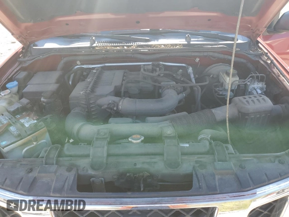 2012 Nissan Frontier S with VIN 1N6BD0CT4CC444596, listed as a Copart auction lot 51220185 with 135,704 mi miles and Salvage title. Bid and sale history available at DreamBid. Image 11.