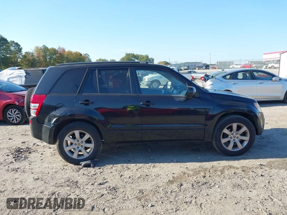 2011 Suzuki Grand Vitara Limited z VIN JS3TE0D72B4100152, wystawiony jako IAAI lot #40676416 z przebiegiem 193 097 mil mil oraz . Historia ofert i sprzedaży dostępna na DreamBid. Obrazek 13.