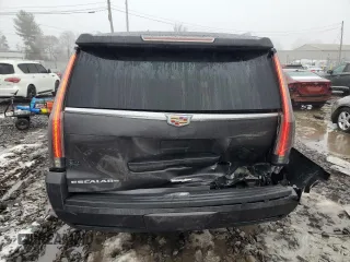 2015 Cadillac Escalade ESV Luxury z VIN 1GYS4SKJ4FR656232, wystawiony jako Copart lot #44584255 z przebiegiem 130 066 mil mil oraz Szkoda całkowita • Salvage title. Historia ofert i sprzedaży dostępna na DreamBid. Obrazek 6.