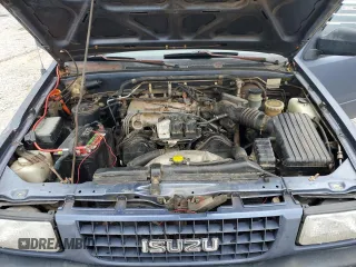 1995 Isuzu Rodeo LS with VIN 4S2CG58V9S4342391, listed as a Copart auction lot 71076344 with 220,708 mi miles and Salvage Title. Bid and sale history available at carsss.com. Image 12.