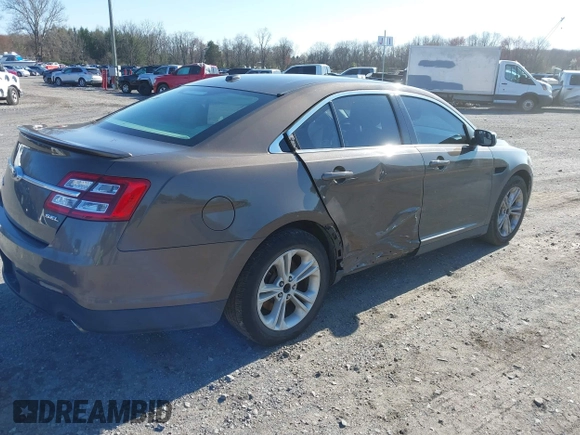 2015 Ford Taurus SEL with VIN 1FAHP2E83FG206055, listed as a IAAI auction lot 41943670 with 90,808 mi miles and . Bid and sale history available at carsss.com. Image 4.