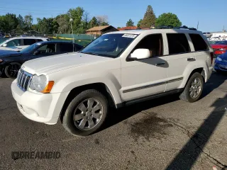 2010 Jeep Grand Cherokee Limited with VIN 1J4RR5GT9AC133344, listed as a Copart auction lot 56851375 with 125,280 mi miles and Salvage title. Bid and sale history available at DreamBid. Image 1.
