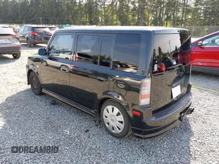 2005 Scion xB with VIN JTLKT334454021261, listed as a IAAI auction lot 42124927 with 221,043 mi miles. Bid and sale history available at carsss.com. Image 3.