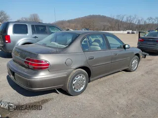 1999 Oldsmobile Cutlass GL z VIN 1G3NB52M6X6329726, wystawiony jako IAAI lot #41769724 z przebiegiem 147 298 mil mil oraz . Historia ofert i sprzedaży dostępna na DreamBid. Obrazek 4.