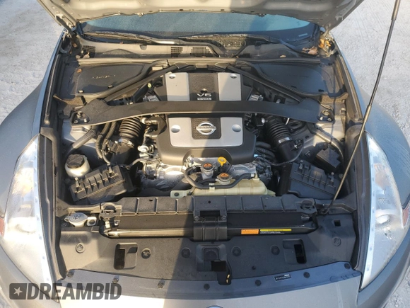 2014 Nissan 370Z Touring with VIN JN1AZ4FH4EM620092, listed as a Copart auction lot 77439254 with 38,662 mi miles and Salvage Title. Bid and sale history available at DreamBid. Image 11.