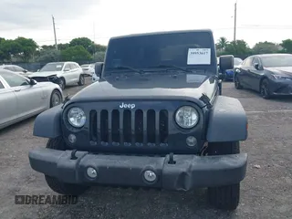 2018 Jeep Wrangler JK Unlimited Sport with VIN 1C4BJWDG5JL858936, listed as a IAAI auction lot 39953617 with 75,865 mi miles. Bid and sale history available at carsss.com. Image 6.