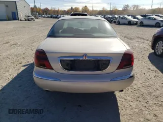 2002 Lincoln Continental with VIN 1LNHM97V62Y699096, listed as a Copart auction lot 77789474 with 106,198 mi miles and Clean Title. Bid and sale history available at carsss.com. Image 6.