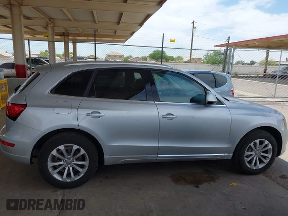 2014 Audi Q5 Premium z VIN WA1CFAFP5EA108342, wystawiony jako IAAI lot #42371378 z przebiegiem 78 602 mil mil oraz . Historia ofert i sprzedaży dostępna na DreamBid. Obrazek 13.