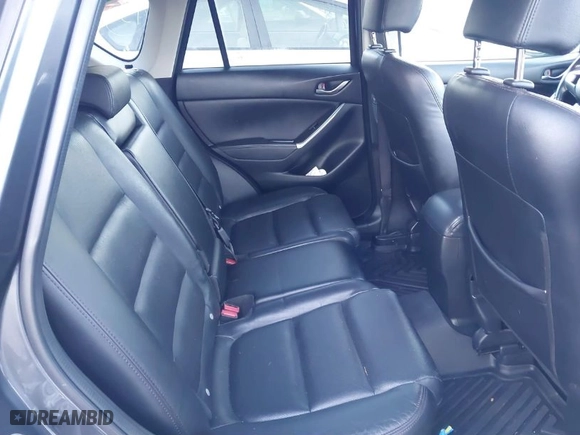 2016 Mazda CX-5 Grand Touring with VIN JM3KE4DY3G0817899, listed as a IAAI auction lot 41287459 with NaN miles. Bid and sale history available at carsss.com. Image 8.