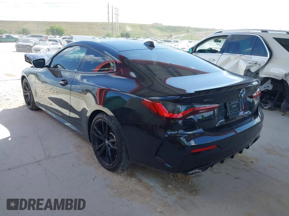 2021 BMW 4 Series M440i xDrive with VIN WBA13AR00MCF61520, listed as a IAAI auction lot 41944350 with 39,631 mi miles and . Bid and sale history available at DreamBid. Image 3.