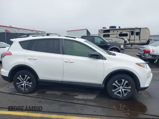 2017 Toyota RAV4 LE with VIN JTMZFREV9HJ704296, listed as a IAAI auction lot 41876996 with 85,605 mi miles and . Bid and sale history available at DreamBid. Image 13.