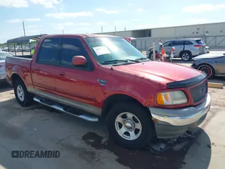2003 Ford F-150 XLT with VIN 1FTRW07623KD16606, listed as a IAAI auction lot 42029457 with 1 mi miles. Bid and sale history available at carsss.com. Image 1.