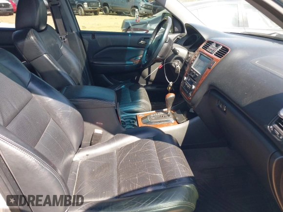 2005 Acura MDX with VIN 2HNYD18265H557625, listed as a IAAI auction lot 41898001 with 192,544 mi miles. Bid and sale history available at carsss.com. Image 5.