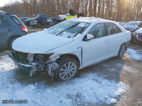 2014 Toyota Camry Hybrid LE with VIN 4T1BD1FK7EU114181, listed as a IAAI auction lot 41294936 with 115,986 mi miles. Bid and sale history available at carsss.com. Image 2.