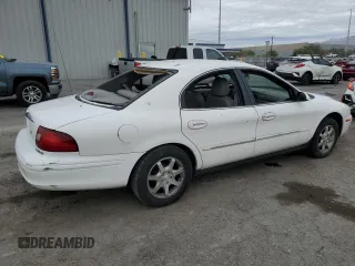2001 Mercury Sable with VIN 1MEFM53U31A629921, listed as a Copart auction lot 77173754 with 122,769 mi miles and Salvage title. Bid and sale history available at DreamBid. Image 3.