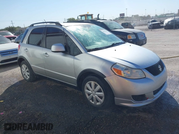 2010 Suzuki SX4 with VIN JS2YA5A30A6301412, listed as a IAAI auction lot 40599958 with 123,177 mi miles. Bid and sale history available at carsss.com. Image 1.