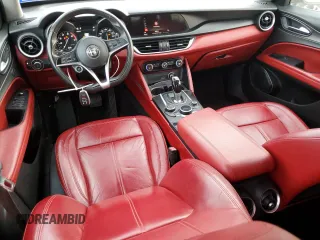 2018 Alfa Romeo Stelvio z VIN ZASFAKAN9J7B88059, wystawiony jako Copart lot #50894085 z przebiegiem 94 280 mil mil oraz Czysty tytuł • Clean title. Historia ofert i sprzedaży dostępna na DreamBid. Obrazek 8.