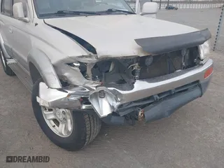 1997 Toyota 4Runner Limited with VIN JT3GN87R2V0024833, listed as a IAAI auction lot 41881359 with 179,115 mi miles. Bid and sale history available at carsss.com. Image 6.