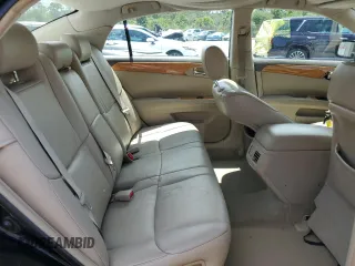 2005 Toyota Avalon XL z VIN 4T1BK36B05U022928, wystawiony jako Copart lot #59137785 z przebiegiem 146 854 mil mil oraz Szkoda całkowita • Salvage title. Historia ofert i sprzedaży dostępna na DreamBid. Obrazek 10.