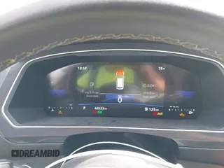 2023 Volkswagen Tiguan S z VIN 3VVRB7AX9PM132401, wystawiony jako IAAI lot #41870969 z przebiegiem 40 533 mil mil oraz . Historia ofert i sprzedaży dostępna na DreamBid. Obrazek 7.