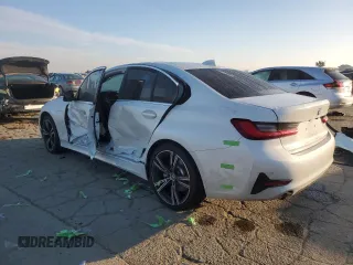 2021 BMW 3 Series 330e with VIN 3MW5P7J08M8B78255, listed as a Copart auction lot 42032355 with 73,815 mi miles and Salvage Title. Bid and sale history available at carsss.com. Image 2.
