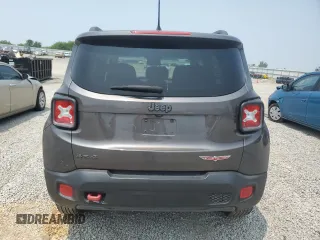 2016 Jeep Renegade Trailhawk with VIN ZACCJBCT5GPC75735, listed as a Copart auction lot 60299005 with 121,990 mi miles and Salvage title. Bid and sale history available at DreamBid. Image 6.