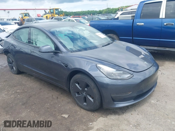 2023 Tesla Model 3 with VIN 5YJ3E1EAXPF628911, listed as a IAAI auction lot 42362410 with 25,387 mi miles and . Bid and sale history available at DreamBid. Image 1.