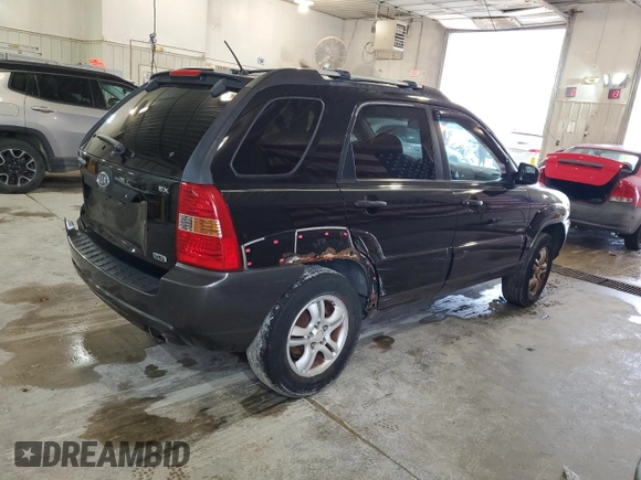 2005 Kia Sportage LX with VIN KNDJE723X57131795, listed as a Copart auction lot 79035214 with 146,746 mi miles and Salvage Title. Bid and sale history available at carsss.com. Image 3.