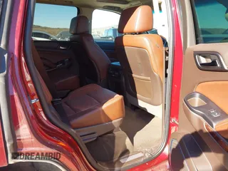 2016 Chevrolet Tahoe LTZ z VIN 1GNSKCKC9GR205745, wystawiony jako IAAI lot #41710241 z przebiegiem 94 931 mil mil oraz . Historia ofert i sprzedaży dostępna na DreamBid. Obrazek 8.