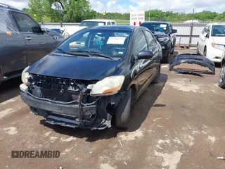 2010 Toyota Yaris with VIN JTDBT4K3XA4076432, listed as a IAAI auction lot 42208274 with 326,837 mi miles. Bid and sale history available at carsss.com. Image 2.