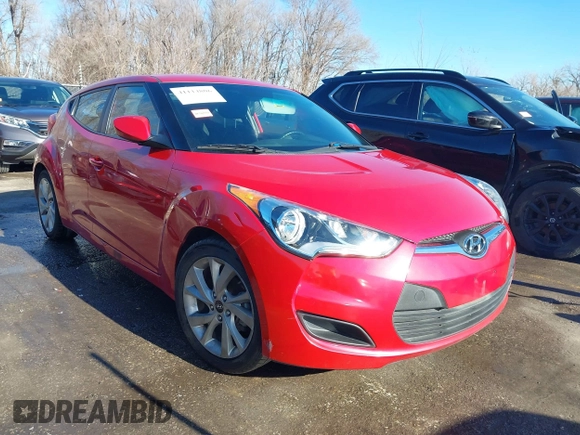2016 Hyundai Veloster z VIN KMHTC6AD1GU260219, wystawiony jako IAAI lot #41114806 z przebiegiem 128 000 mil mil oraz . Historia ofert i sprzedaży dostępna na DreamBid. Obrazek 1.