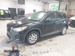 2013 Mazda CX-5 Sport with VIN JM3KE2BE3D0168842, listed as a IAAI auction lot 42653618 with 256,392 mi miles and . Bid and sale history available at DreamBid. Image 2.