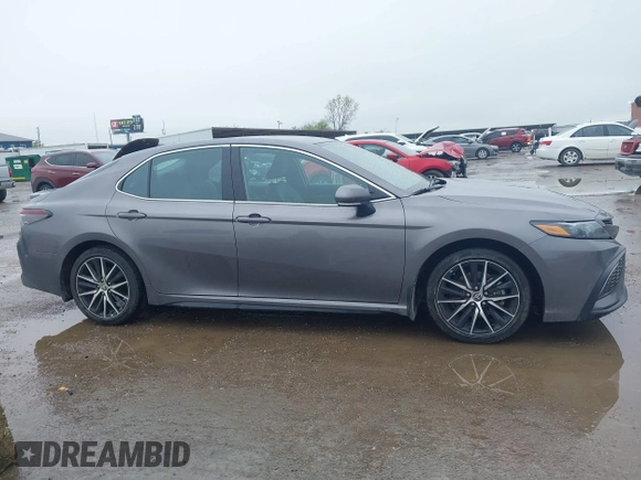 2023 Toyota Camry SE z VIN 4T1T11AK0PU084934, wystawiony jako IAAI lot #41962805 z przebiegiem 39 395 mil mil oraz . Historia ofert i sprzedaży dostępna na DreamBid. Obrazek 13.