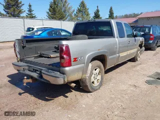 2003 Chevrolet Silverado 1500 LS with VIN 2GCEK19T231104873, listed as a IAAI auction lot 41910444 with 208,692 mi miles. Bid and sale history available at carsss.com. Image 4.