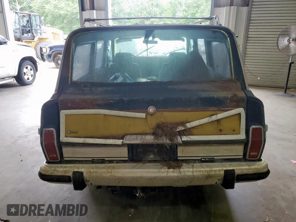 1986 Jeep Grand Wagoneer с VIN 1JCNJ15U5GT147524, выставлен на аукционе Copart как лот 57421255 с пробегом 112 292 миль миль и Списание • Salvage title. История ставок и продаж доступна на DreamBid. Изображение 6.