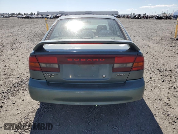 2002 Subaru Legacy L with VIN 4S3BE635526206144, listed as a Copart auction lot 64995045 with 172,886 mi miles and Salvage title. Bid and sale history available at DreamBid. Image 6.