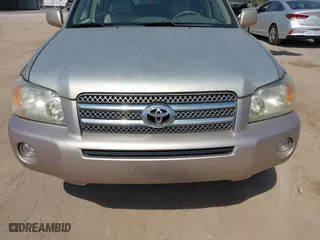 2006 Toyota Highlander Hybrid with VIN JTEDW21A460001983, listed as a IAAI auction lot 41919095 with 303,345 mi miles. Bid and sale history available at carsss.com. Image 6.